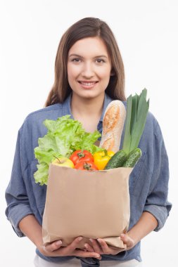 Attractive fit girl with fresh healthy food