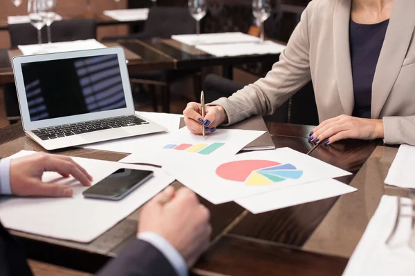 Cheerful two colleagues are discussing new project — Stockfoto