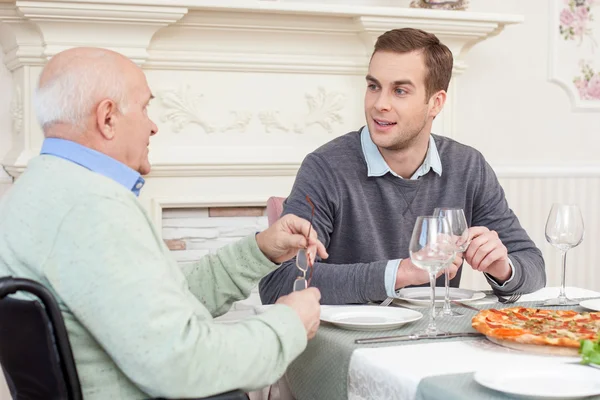 Pretty friendly family has a lunch at home — Zdjęcie stockowe