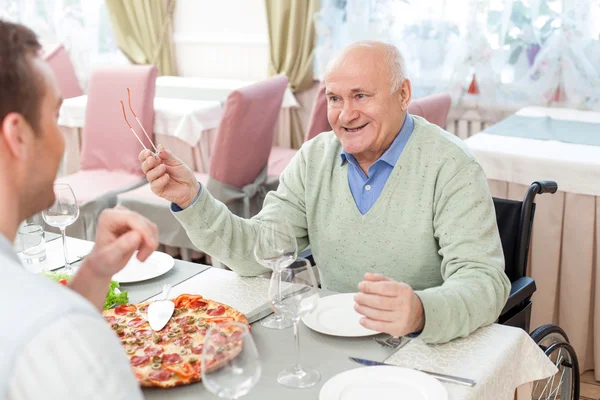 Cheerful family has a lunch in cafe — Φωτογραφία Αρχείου