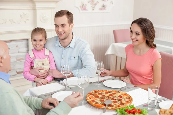 Mature man is celebrating his birthday with relatives — Stock Photo, Image