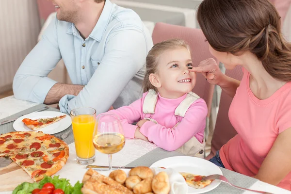 Pretty friendly family is dining together — Stock Photo, Image