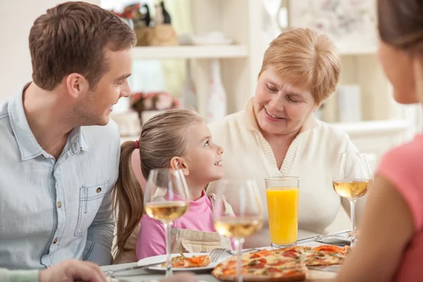 Old lady is celebrating her birthday with family — Zdjęcie stockowe