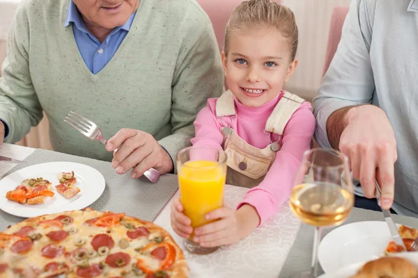 Cheerful friendly family has a lunch together — Stock Photo, Image
