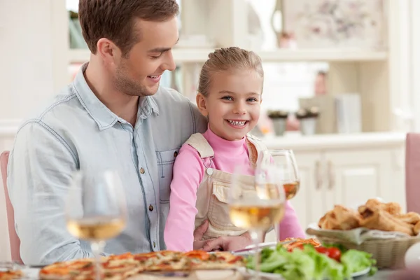 Cute man is dining with his child — Stock Photo, Image