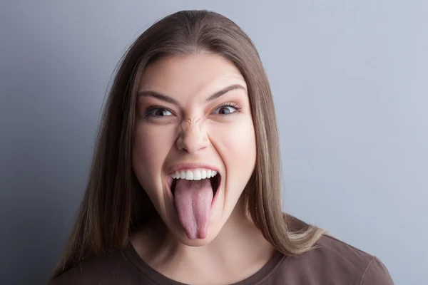 Irritated young girl is evincing her negativity — Stok fotoğraf