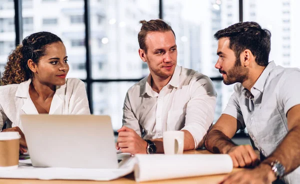 Group of professional business meeting and discussing strategy with new startup project.Creative business people planning and brainstorm with laptop computer in modern workloft.Teamwork concept