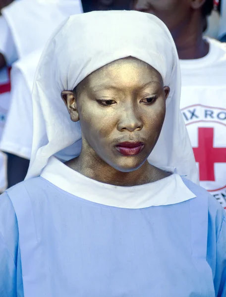 Geschilderde Haïtiaanse verpleegkundige — Stockfoto