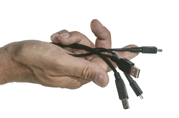 Computer cables in hand on white background — Stock Photo, Image