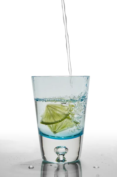 Glass of water and lime Stock Image