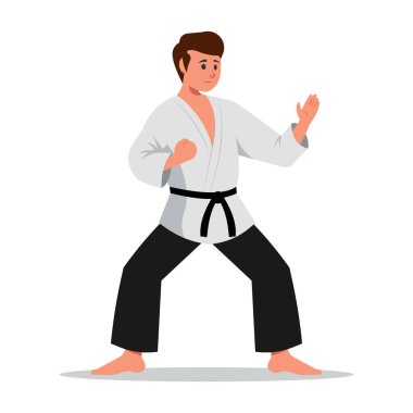Karate uygulayıcısı güçlü bir duruş sergiliyor.