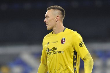 Bologna 'lı Lukasz Skorupski, İtalya Serie A maçında Napoli ile Bologna arasında oynanan maçın son maçı 3-1, Diego Armando Maradona Stadyumu' nda oynandı. İtalya, 07 Mart 2021. 