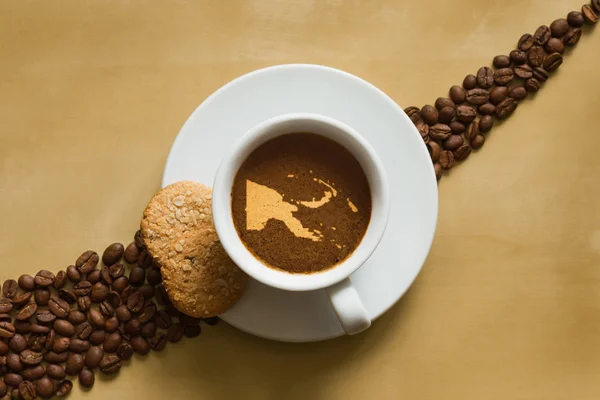 Stillleben - Kaffee mit Karte von Papua Neuguinea — Stockfoto