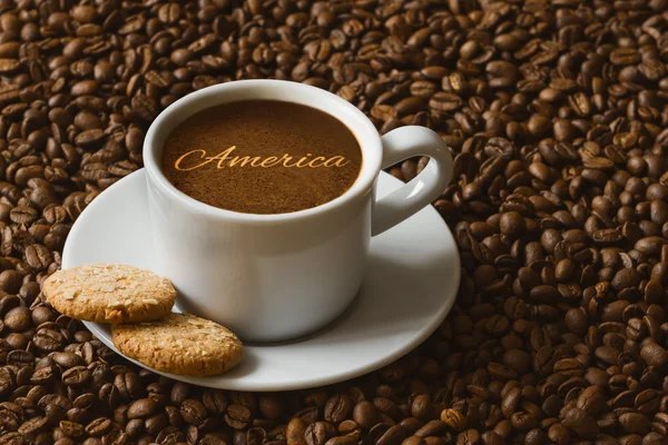 Fremdeles liv - kaffe med tekst Amerika – stockfoto