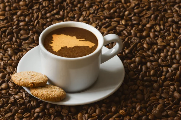 静物-咖啡与多米尼加共和国地图 免版税图库图片