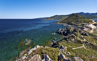 Parata peninsula seen from Genoese Tower  clipart