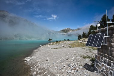 Solar panel in service cabin of Aubert lake dam clipart