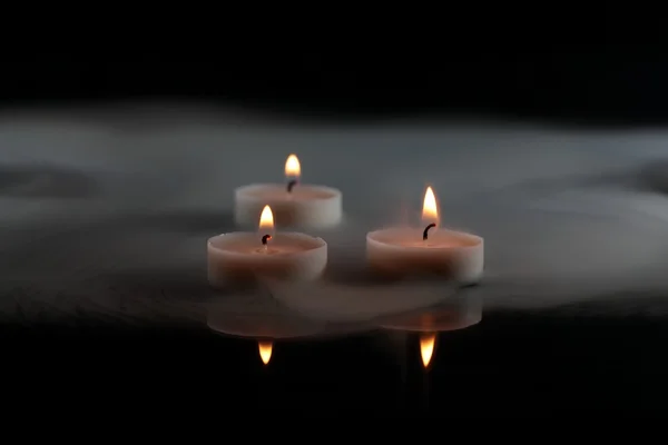 Candles in the mist — Stock Photo, Image