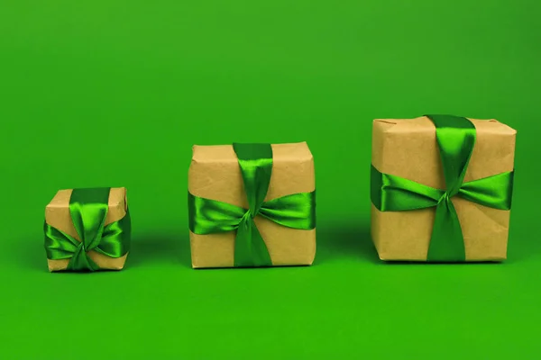 Three Square Boxes Green Background — Stock Photo, Image