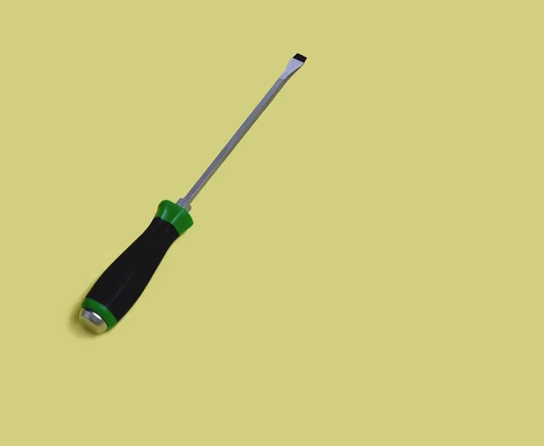 Long Sized Screwdriver Flat Magnetic Head Black Green Handle Isolated — Stock Photo, Image