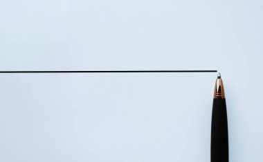 Horizontal ruled paper with a pen tip at the edge, ample copy space for notes and clean minimal planning