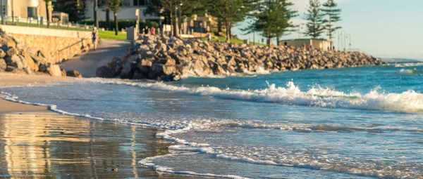 Wave washing the Glenelg beach — Stock Photo, Image