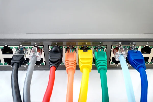 Network Switch with connected coloured cables — Stock Photo, Image