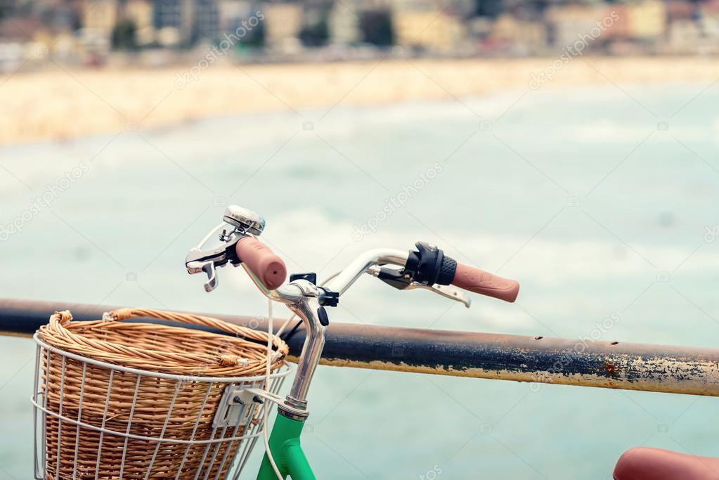 Bicycle with basket at the beach