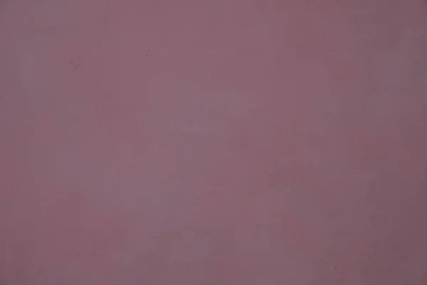 Duvarda mor alçı, düzgün bir arka plan..