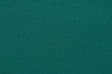 Dokulu bir yüzeyi ve kumaşı olan yeşil-mavi homojen arkaplan.