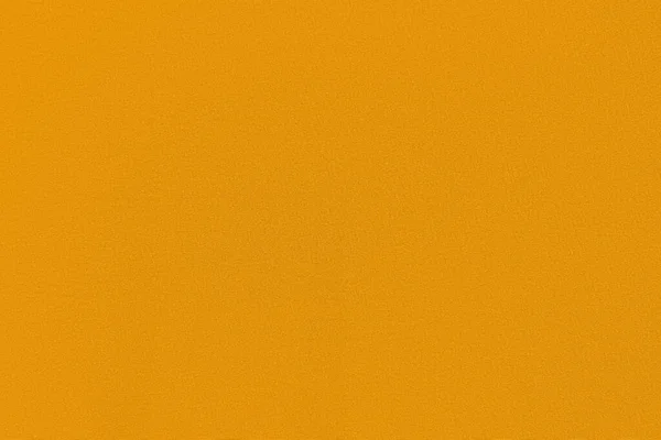 Kalıplaşmış yüzeyi olan altın homojen bir arka plan. Gri kumaş.