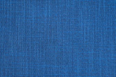 Telaffuz edilmiş kumaşlı mavi kumaş, iplik dokuyor. Mobilya kumaşı, arkaplan.