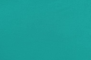 Dokulu bir yüzeyi ve kumaşı olan homojen yeşil arkaplan.