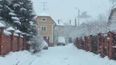The road home. View from behind the car window Video clip House in the snow
