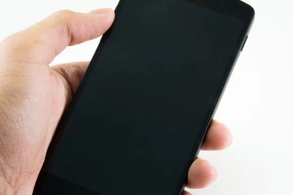 Schwarze moderne Smartphones in der Hand auf weißem Hintergrund — Stockfoto