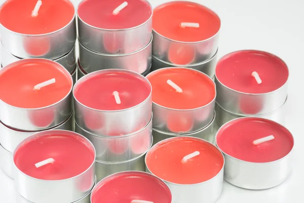 Red candles on white background — Stock Photo, Image