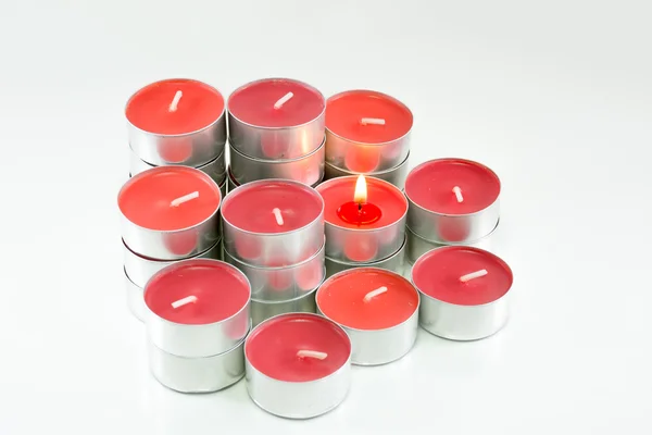 Red candles on white background — Stock Photo, Image