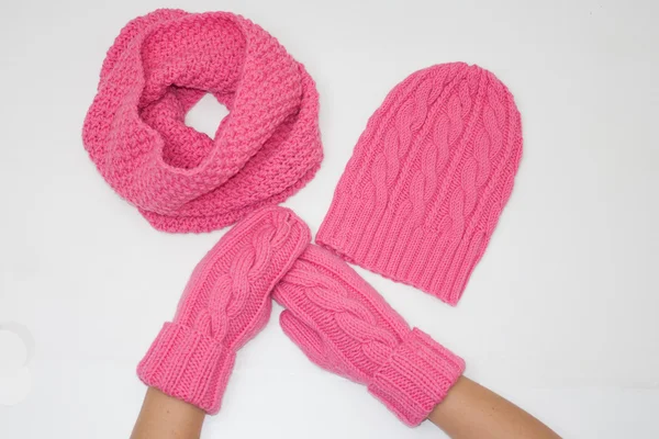 Kit consisting of mittens, hats and snood connected manually pink thread — Stock Photo, Image