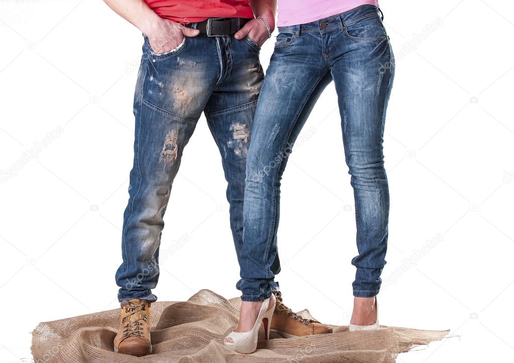A man and a woman in blue jeans