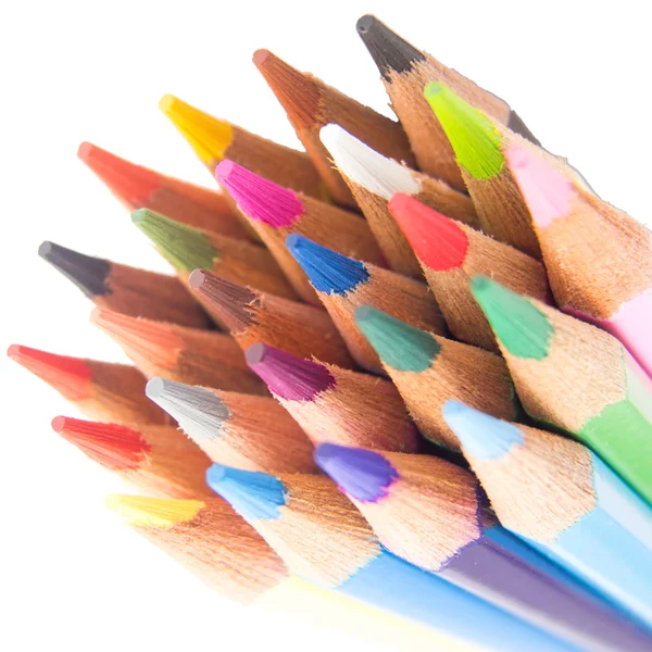 Slim crayon tips diagonal on white — Stock Photo, Image