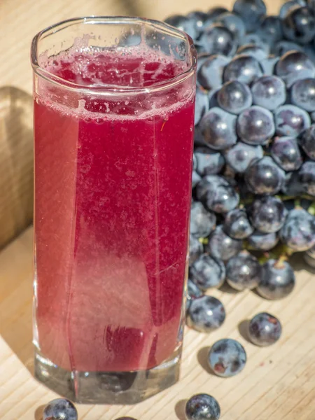 glass of stum and grapes