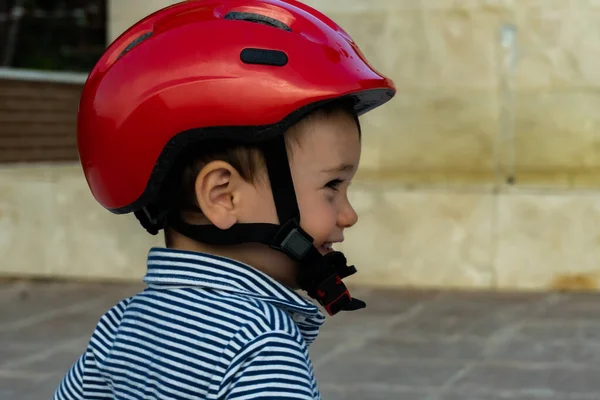 Child Red Helmet Blue White Striped Shirt Smiling Profile — Stock Photo, Image