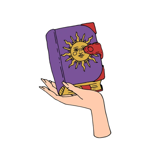 Libro de hechizos místicos vintage de oro y negro con sol en la cubierta en la mano femenina — Vector de stock