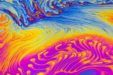 Psikedelik çok renkli desenler arka planı. Sabun köpüklerinin makro fotoğraf çekimi