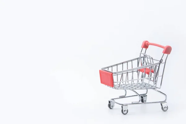 Concepto Compras Carrito Compras Rojo Sobre Fondo Blanco Con Spac — Foto de Stock