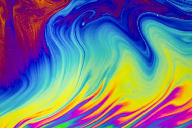 Psikedelik çok renkli desenler arka planı. Sabun köpüğünün makro fotoğrafı