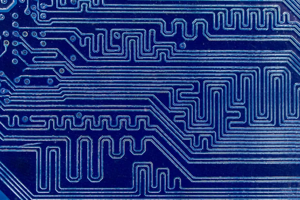 close up of blue electronics circuit board