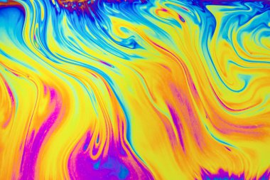 Gökkuşağı renkleri. Psikedelik çok renkli desenler arka planı. Sabun köpüğünün makro fotoğrafı