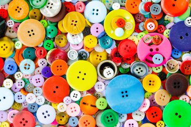 Renkli karışık dikiş düğmeleri arkaplanı. Üst görünüm