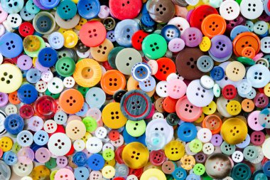 Renkli karışık dikiş düğmeleri arkaplanı. Üst görünüm